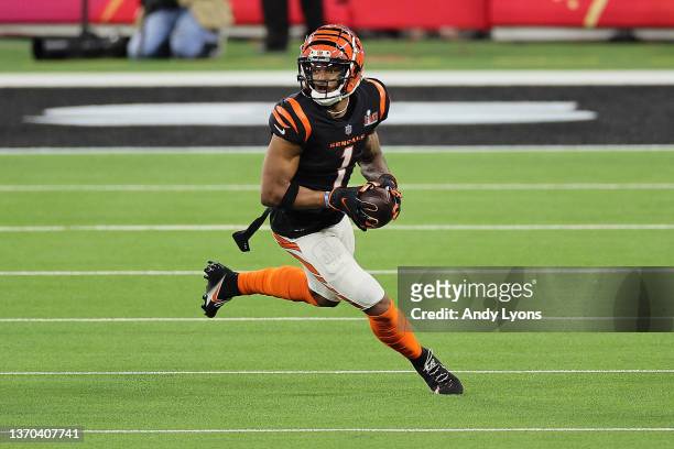 Ja'Marr Chase of the Cincinnati Bengals runs with the ball in the fourth quarter during Super Bowl LVI against the Los Angeles Rams at SoFi Stadium...