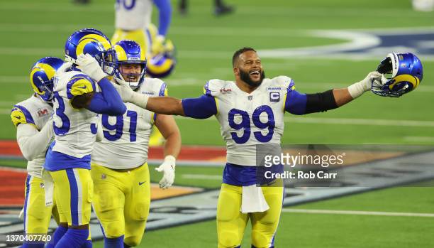 Aaron Donald of the Los Angeles Rams reacts following a fourth down stop during the fourth quarter of Super Bowl LVI against the Cincinnati Bengals...