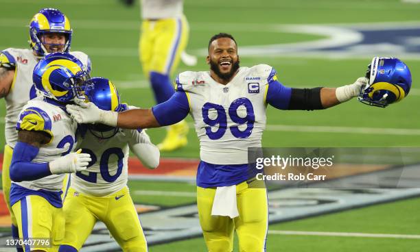 Aaron Donald of the Los Angeles Rams reacts following a fourth down stop during the fourth quarter of Super Bowl LVI against the Cincinnati Bengals...