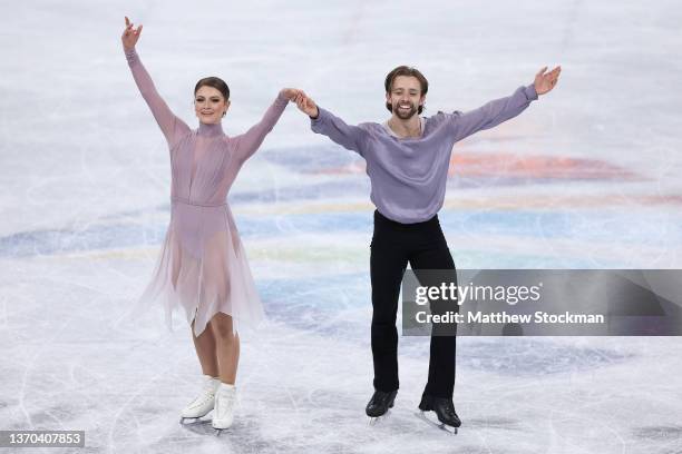 Kaitlin Hawayek and Jean-Luc Baker of Team United States react during the Ice Dance Free Dance on day ten of the Beijing 2022 Winter Olympic Games at...