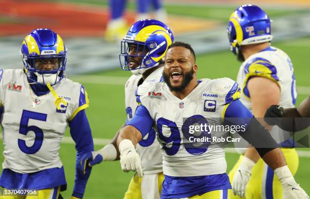 Aaron Donald and Greg Gaines the Los Angeles Rams react during the fourth quarter of Super Bowl LVI against the Cincinnati Bengals at SoFi Stadium on...