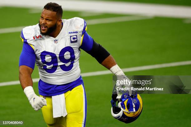 Aaron Donald of the Los Angeles Rams reacts after a sack on Joe Burrow of the Cincinnati Bengals during Super Bowl LVI at SoFi Stadium on February...
