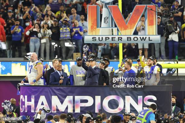 Owner of the Los Angeles Rames Stan Kroenke holds up the Vince Lombardi Trophy after Super Bowl LVI at SoFi Stadium on February 13, 2022 in...