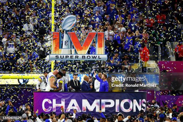 Head coach Sean McVay of the Los Angeles Rams holds up the Vince Lombardi Trophy after Super Bowl LVI at SoFi Stadium on February 13, 2022 in...