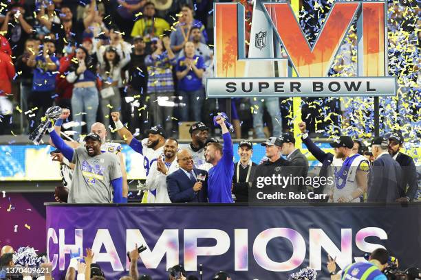 Von Miller of the Los Angeles Rams holds up the Vince Lombardi Trophy after Super Bowl LVI at SoFi Stadium on February 13, 2022 in Inglewood,...