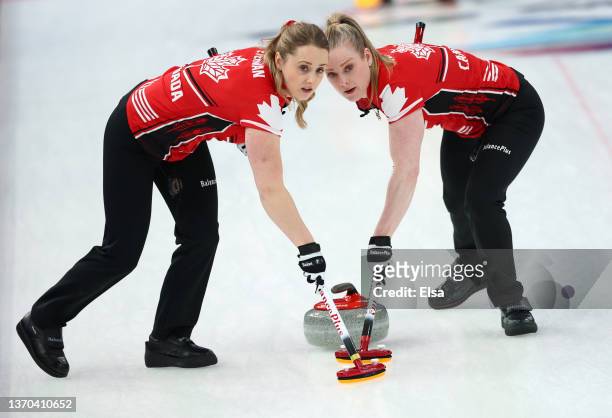 Jocelyn Peterman and Dawn McEwen of Team Canada compete during the Women’s Curling Round Robin Session against Team ROC on Day 10 of the Beijing 2022...