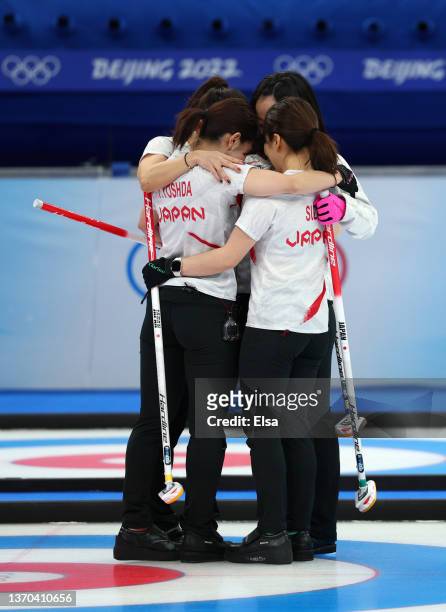 Team Japan celebrates after winning their Women’s Curling Round Robin Session against Team China 11on Day 10 of the Beijing 2022 Winter Olympic Games...