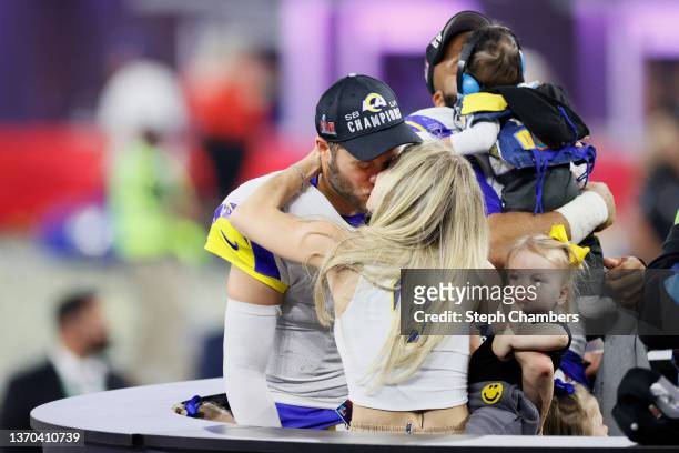 Matthew Stafford of the Los Angeles Rams celebrates with his wife Kelly Hall following Super Bowl LVI at SoFi Stadium on February 13, 2022 in...