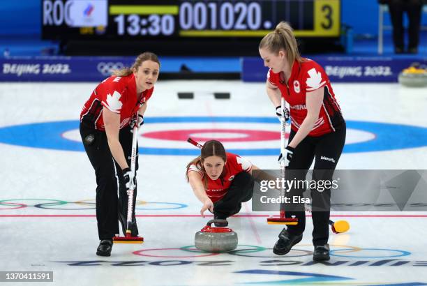 Jocelyn Peterman, Kaitlyn Lawes and Dawn McEwen of Team Canada compete during the Women’s Curling Round Robin Session against Team ROC on Day 10 of...