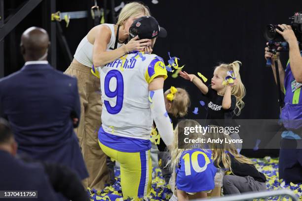 Matthew Stafford of the Los Angeles Rams celebrates with his wife Kelly Stafford and their family following Super Bowl LVI at SoFi Stadium on...