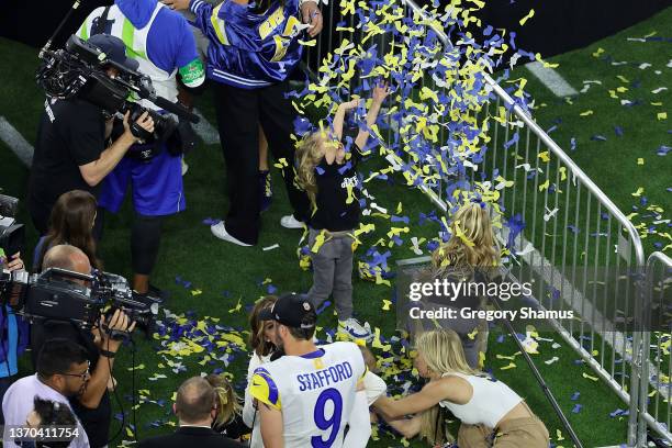 Matthew Stafford of the Los Angeles Rams celebrates with his wife Kelly Stafford and their family following Super Bowl LVI at SoFi Stadium on...