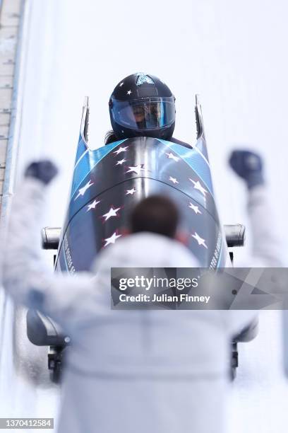 Elana Meyers Taylor of Team United States reacts during the Women's Monobob Bobsleigh Heat 4 on day 10 of Beijing 2022 Winter Olympic Games at...