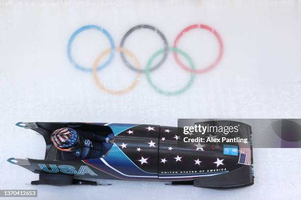 Kaillie Humphries of Team United States slides during the Women's Monobob Bobsleigh Heat 4 on day 10 of Beijing 2022 Winter Olympic Games at National...