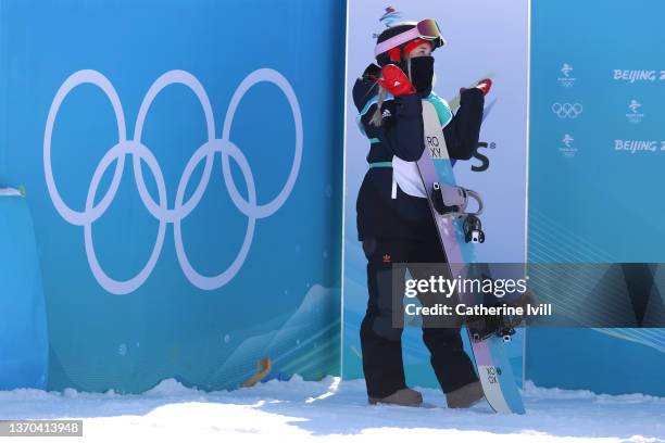 Katie Ormerod of Team Great Britain reacts after their run during the Women's Snowboard Big Air Qualification on Day 10 of the Beijing 2022 Winter...