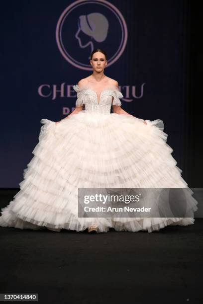 Maxina Annika walks the runway during Chelsea Couture Bridal At New York Fashion Week Powered By Art Hearts Fashion at The Ziegfeld Ballroom on...