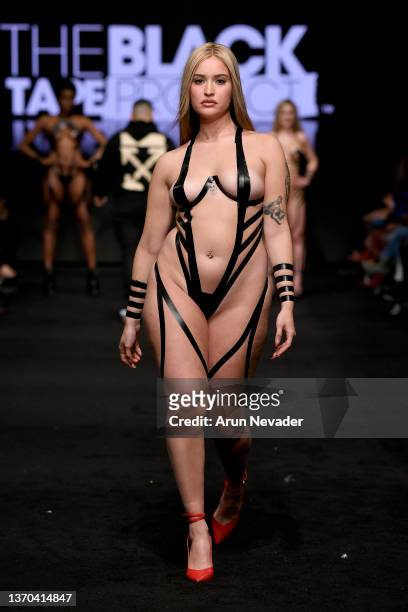 Designer and model on the runway during Black Tape Project At New York Fashion Week Powered By Art Hearts Fashion at The Ziegfeld Ballroom on...