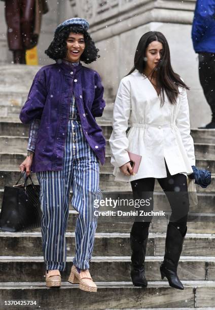 Sophia Roe is seen wearing a purple jacket and blue striped one piece outside the Ulla Johnson show during New York Fashion Week A/W 2022 on February...