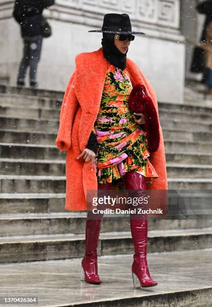 Denisa Palsha is seen wearing a Richard Quinn dress, Dior boots and Balenciaga sunglasses outside the Ulla Johnson show during New York Fashion Week...