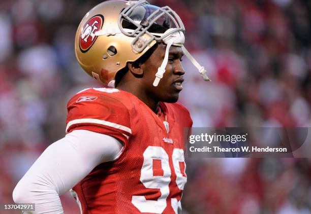 Aldon Smith of the San Francisco 49ers looks on during the NFC Divisional playoff game against the New Orleans Saints at Candlestick Park on January...