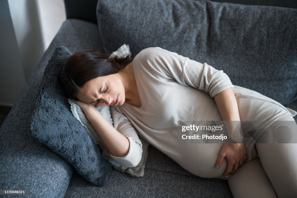 Pregnant woman at home