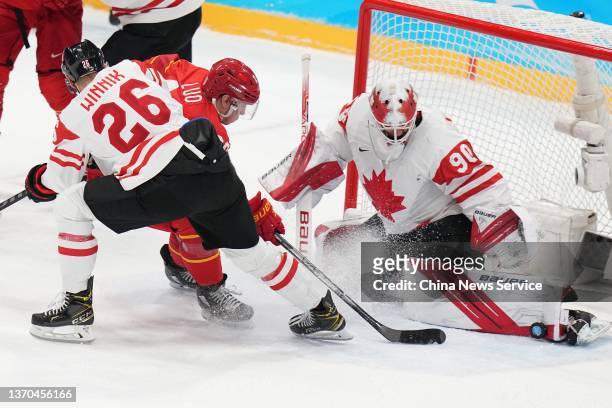 Goaltender Matt Tomkins of Team Canada competes during the Men's Ice Hockey Preliminary Round Group A match between Team China and Team Canada on Day...