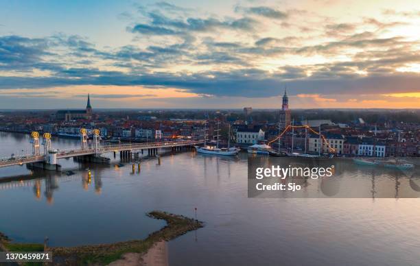 kampen sunset during winter at the river ijssel - kampen overijssel stock pictures, royalty-free photos & images