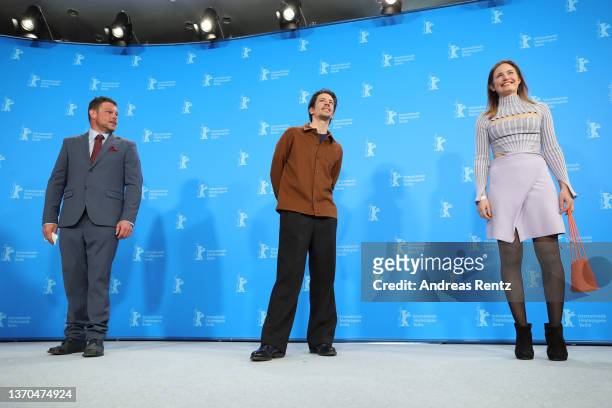 Simon Wisler, Director Michael Koch and Michele Brand pose at the "Drii Winter" photocall during the 72nd Berlinale International Film Festival...