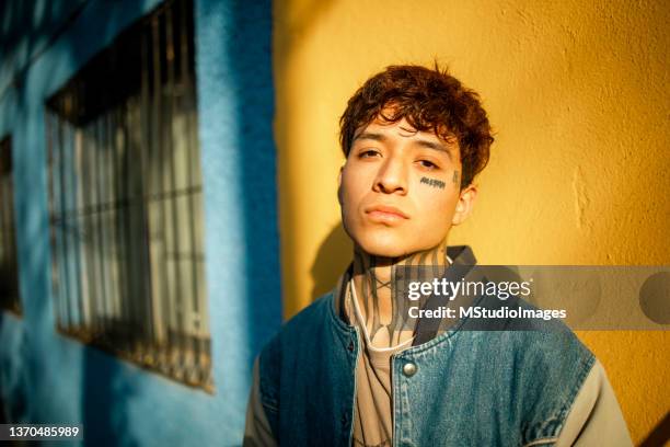 portrait of young man - stern gold stock pictures, royalty-free photos & images