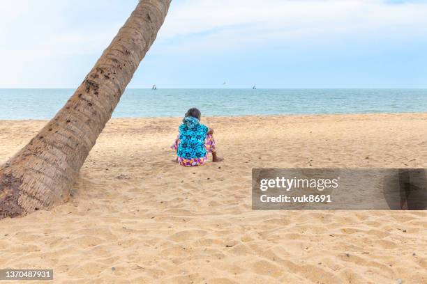 relaxing on the beach - negombo stock pictures, royalty-free photos & images