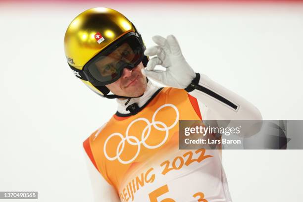 Simon Ammann of Team Switzerland celebrates during the Men's Ski jumping Final Round on Day 10 of Beijing 2022 Winter Olympics at National Ski...