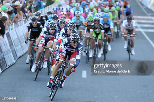 Adam Hansen of Australia and Team Lotto - Belisol leads the peloton with one lap to go during the 2012 Tour Down Under Classic on January 15, 2012 in...