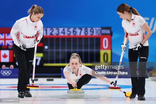 Jocelyn Peterman, Dawn McEwen and Kaitlyn Lawes of Team Canada compete against Team Great Britain during the Women’s Curling Round Robin Session 8 on...