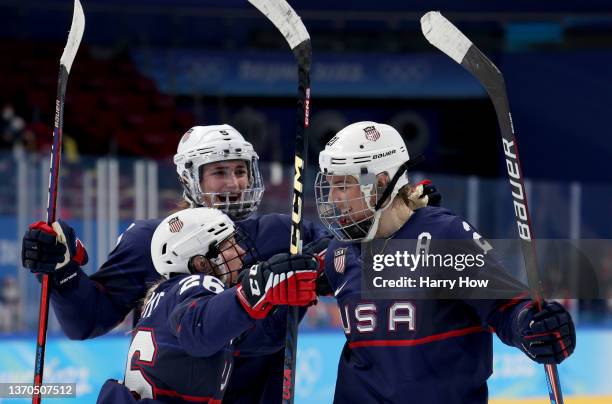 Forward Hilary Knight of Team United States celebrates her goal with forward Kendall Coyne Schofield of Team United States and defender Megan Keller...