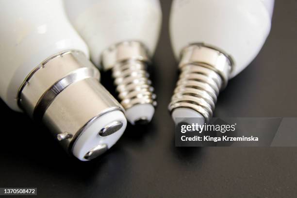 light bulbs - fluorescent light bulb stock pictures, royalty-free photos & images