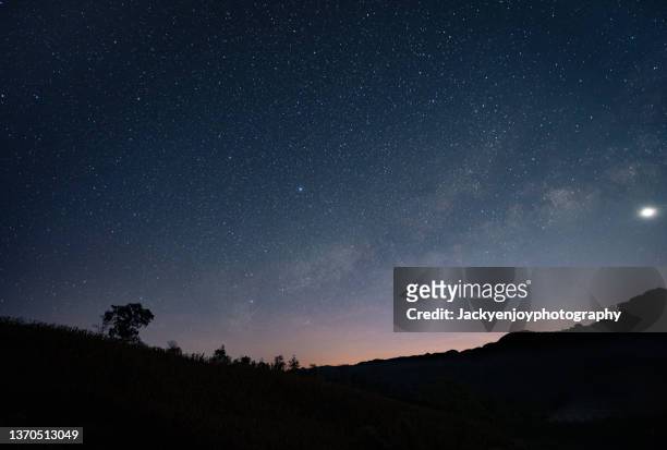 milky way at doi inthanon national park, chiang mai, thailand - dusk stock pictures, royalty-free photos & images