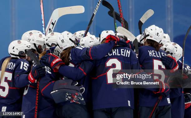 Team United States celebrates their 4-1 win over Team Finalnd in the third period during the Women's Ice Hockey Playoff Semifinal match between Team...