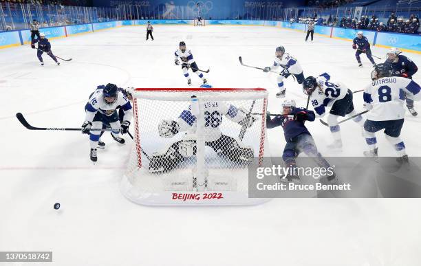 Goalkeeper Anni Keisala of Team Finland and defender Minnamari Tuominen of Team Finland defend the goal against forward Hannah Brandt of Team United...