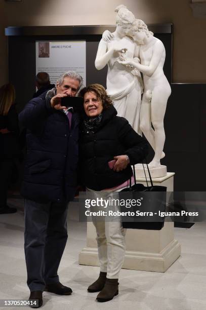 Couple of ancient lovers take a selfie on Valentine's Day with the italian neoclassical artist Antonio Canova's masterpiece "Amore E Psiche" during...