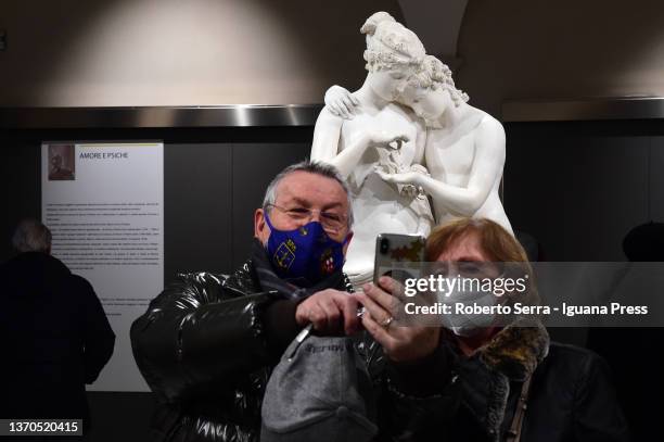 Couple of ancient lovers take a selfie on Valentine's Day with the italian neoclassical artist Antonio Canova's masterpiece "Amore E Psiche" during...