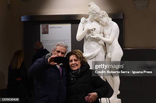 Couple of ancient lovers take a selfie on Valentine's Day with the italian neoclassical artist Antonio Canova's masterpiece "Amore E Psiche" during...