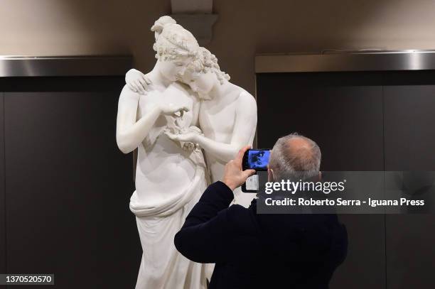 VIsitors admires the italian neoclassical artist Antonio Canova's masterpiece "Amore E Psiche" during the "Antonio Canova Glory of Treviso"...