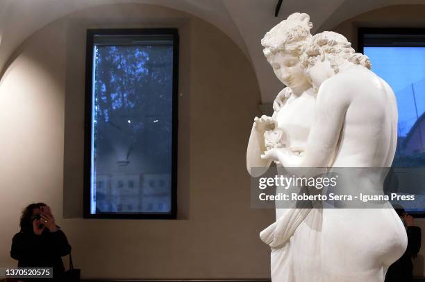 VIsitors admires the italian neoclassical artist Antonio Canova's masterpiece "Amore E Psiche" during the "Antonio Canova Glory of Treviso"...