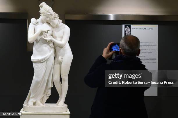 VIsitors admires the italian neoclassical artist Antonio Canova's masterpiece "Amore E Psiche" during the "Antonio Canova Glory of Treviso"...