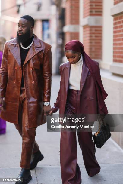 Aissata Diallo and guest are seen outside Herve Leger during New York Fashion Week on February 11, 2022 in New York City.