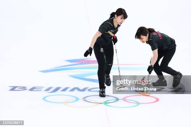 Yurika Yoshida and Yumi Suzuki of Team Japan compete against Team South Korea during the Women’s Curling Round Robin Session 8 on Day 10 of the...