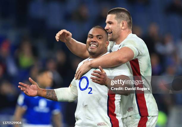 Kyle Sinckler of England celebrates with team mate Charlie Ewels after scoring their fifth try during the Guinness Six Nations match between Italy...