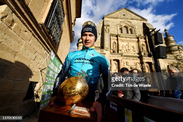 Alexey Lutsenko of Kazahkstan and Team Astana – Qazaqstan holds the olive trophy and celebrates winning the race on the podium ceremony with the...