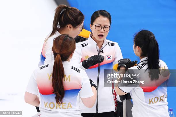 Kim Yeong-Mi, Kim Seon-Yeong, Kim Eun-Jung and Kim Kyeong-Ae of Team South Korea interact while competing against Team Japan during the Women’s...