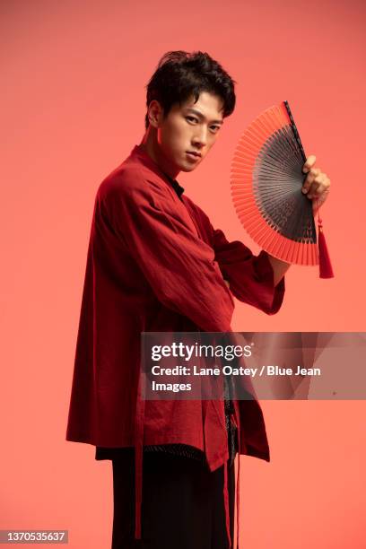 portrait of confident young man - cosplay stock pictures, royalty-free photos & images