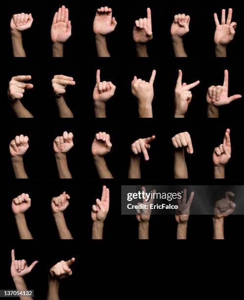 mano alfabeto de lenguaje de signos - gesticulando con la mano fotografías e imágenes de stock